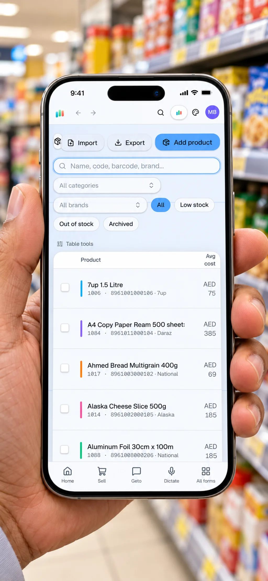 Shopkeeper holding a phone with the AIFFICIENTO app in a grocery aisle
